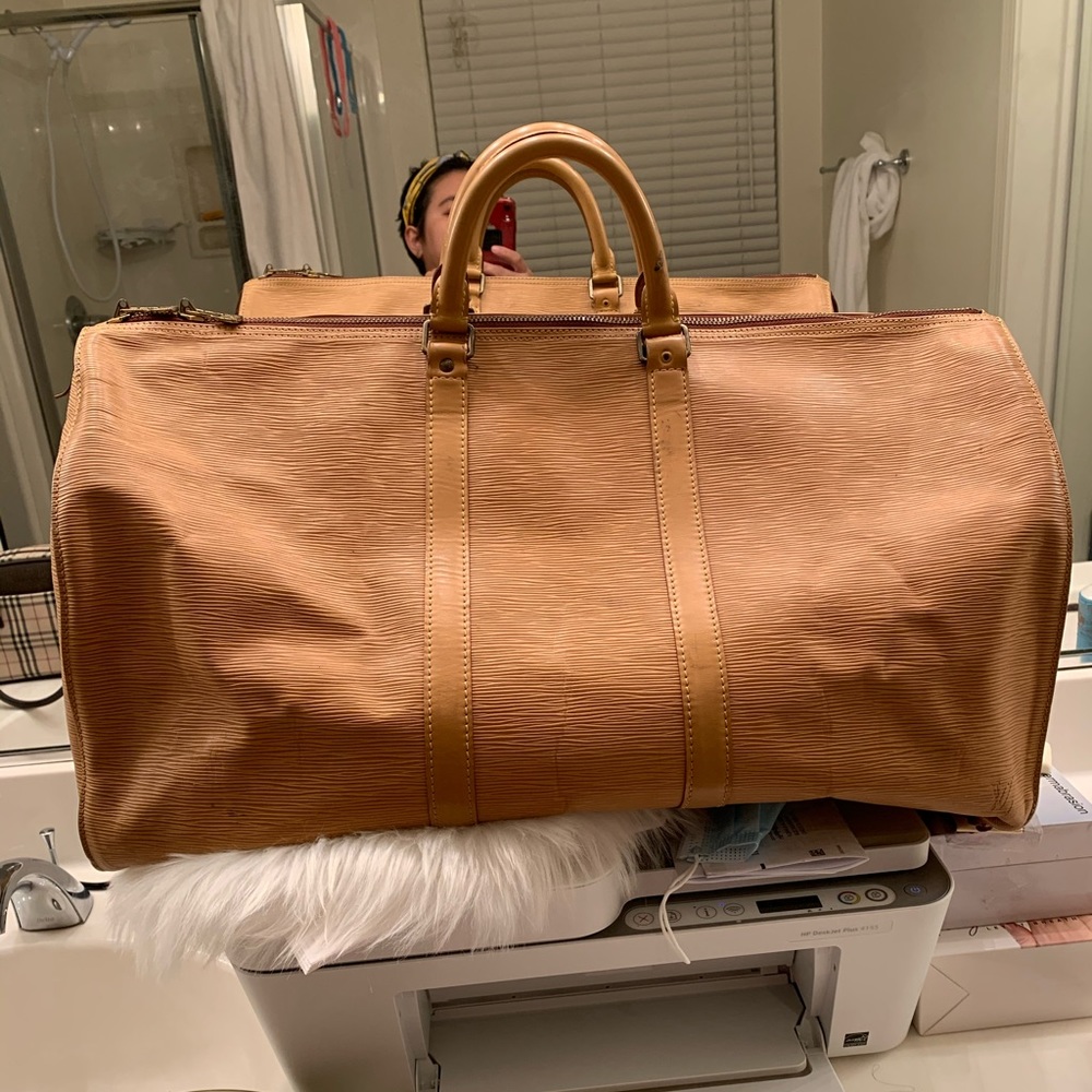 Authentic Louis Vuitton epi Kepall 55